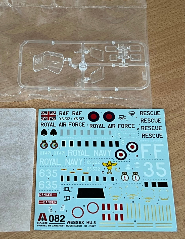 model kit decals on a wooden background