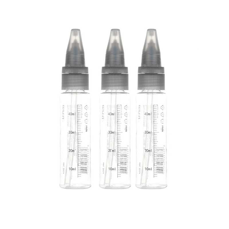 Three clear plastic bottles with measurement markings on a white background