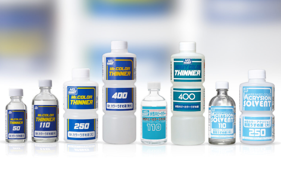 Collection of Mr Hobby thinners bottles with labels on a white background
