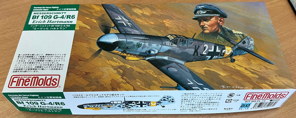 Finemolds FL13 box on a wooden background