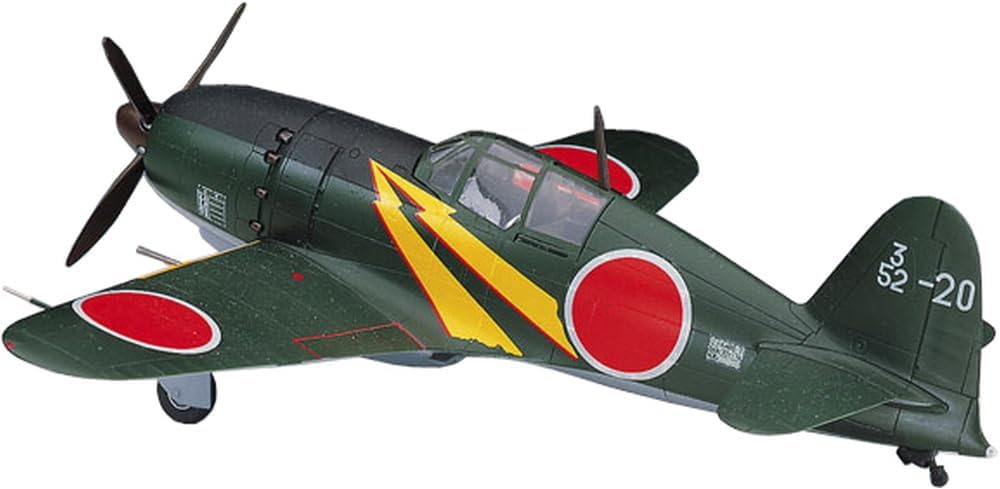 Model airplane with a green body, red and yellow accents, and a propeller on a white background.