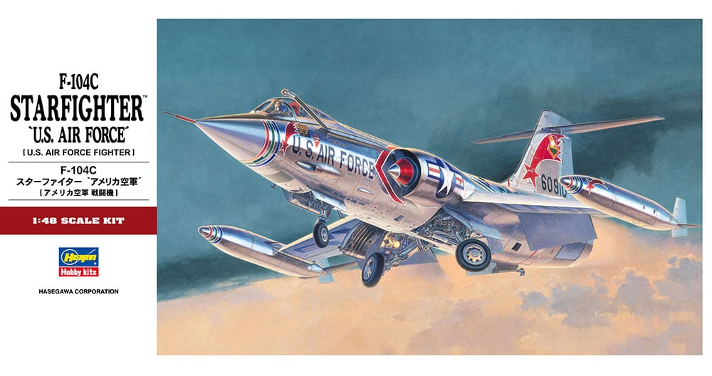 Model kit of a U.S. Air Force fighter jet with a colorful design on a blue sky background.