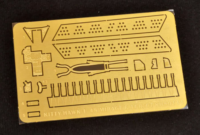 photo-etch parts with text on a black background