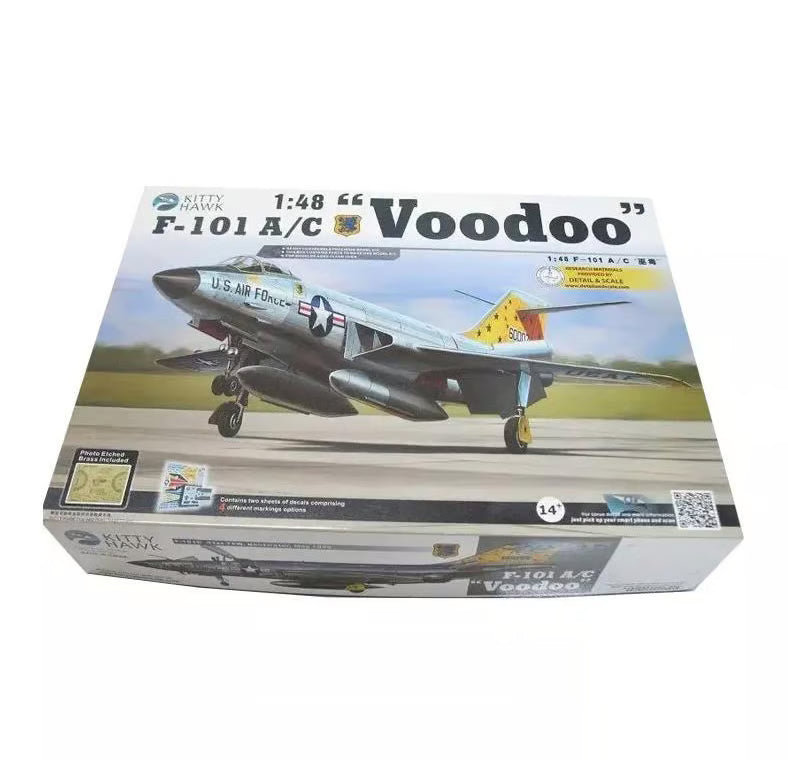 Model kit box for Kitty Hawk F-101 A/C Voodoo airplane on a runway with clear sky background.