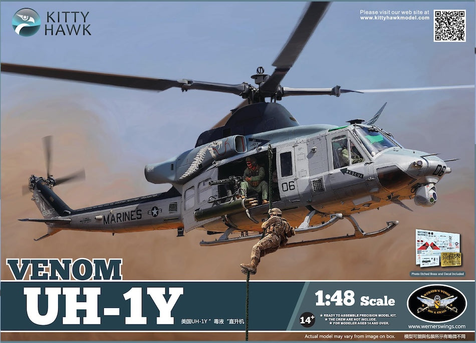 Model helicopter kit of a Venom UH-1Y with soldiers on a desert background, branded 'Kitty Hawk'.
