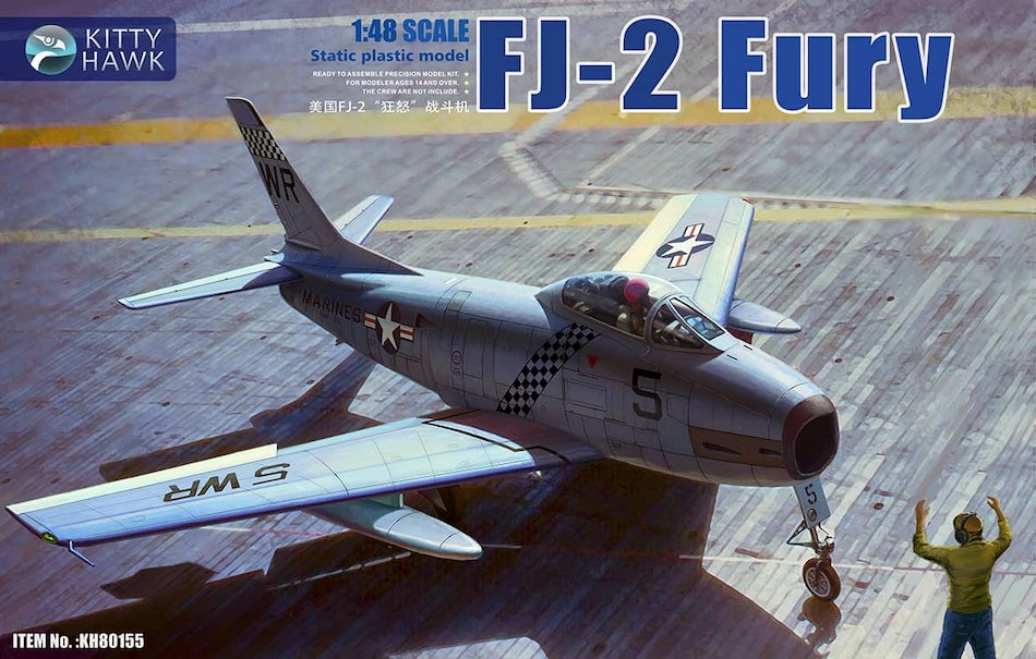 Model of a FJ-2 Fury airplane on an aircraft carrier deck with Kitty Hawk branding.