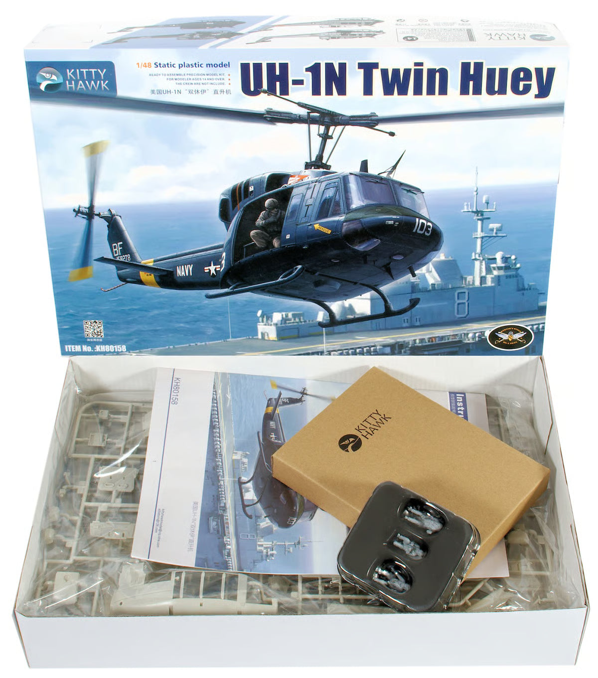Kitty Hawk model kit of a UH-1N Twin Huey helicopter on a ship with Kitty Hawk branding.